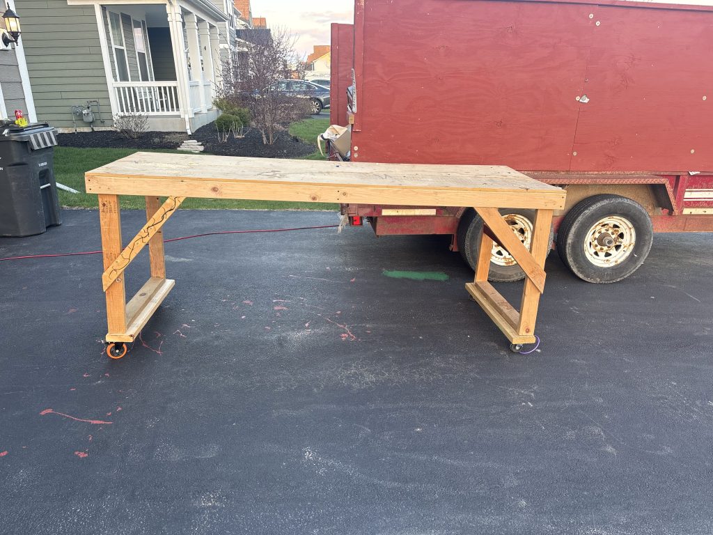 Large workbench staged on driveway before removal by Junk Nurse in Aurora IL